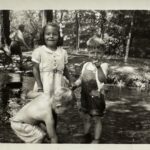 Sherla, Dexter and Dennis playing in the creek at Milham Park in Kalamazoo